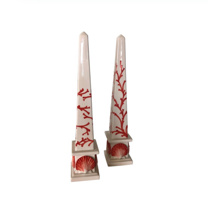 A Pair of Ceramic Coral & Shell Design Obelisks