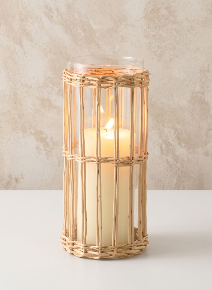 Tall Halong Cane Weaved Glass Cylinder glowing with a pillar candle