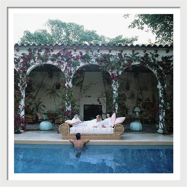 Sofa By The Pool by Slim Aarons, 20" x 20", white frame and white mat