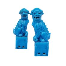 Pair of Turquoise Porcelain Foo Dog Sculptures