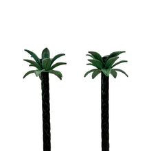 Pair of Celedon Iron Palm Tree Candle Sticks
