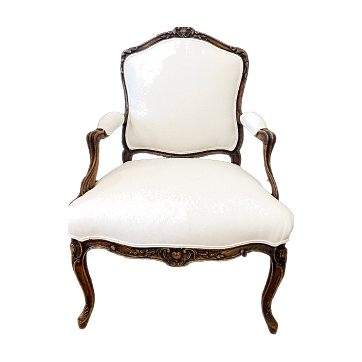 Antique French Provincial Bergere Chair Newly Upholstered in White Nailhead Fabric on a white background