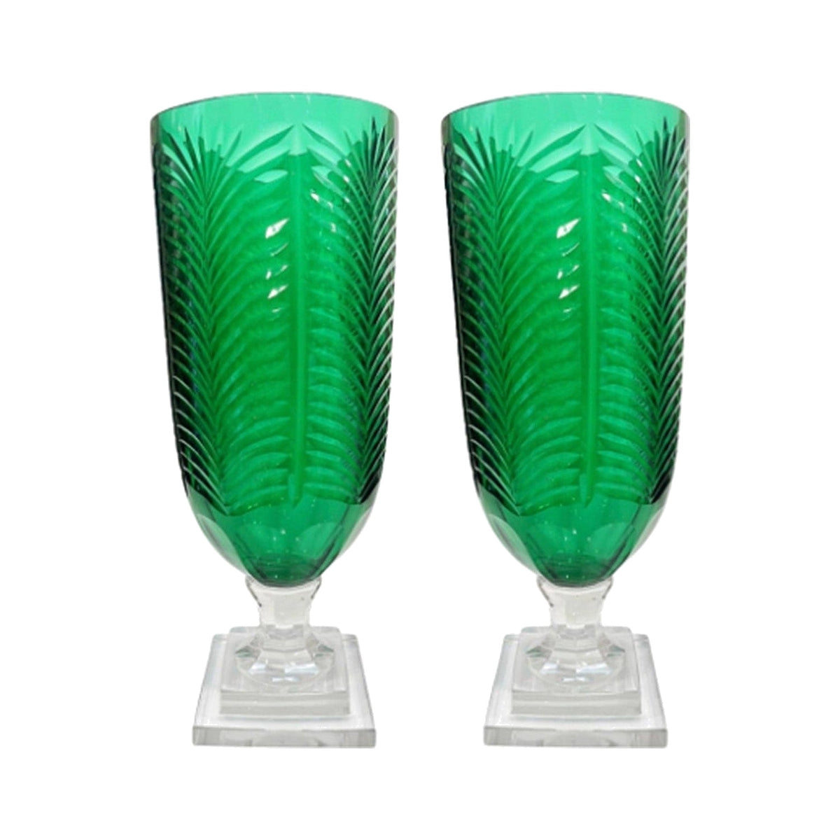 A Pair, Large Etched Palm Green Glass Hurricanes on a white background
