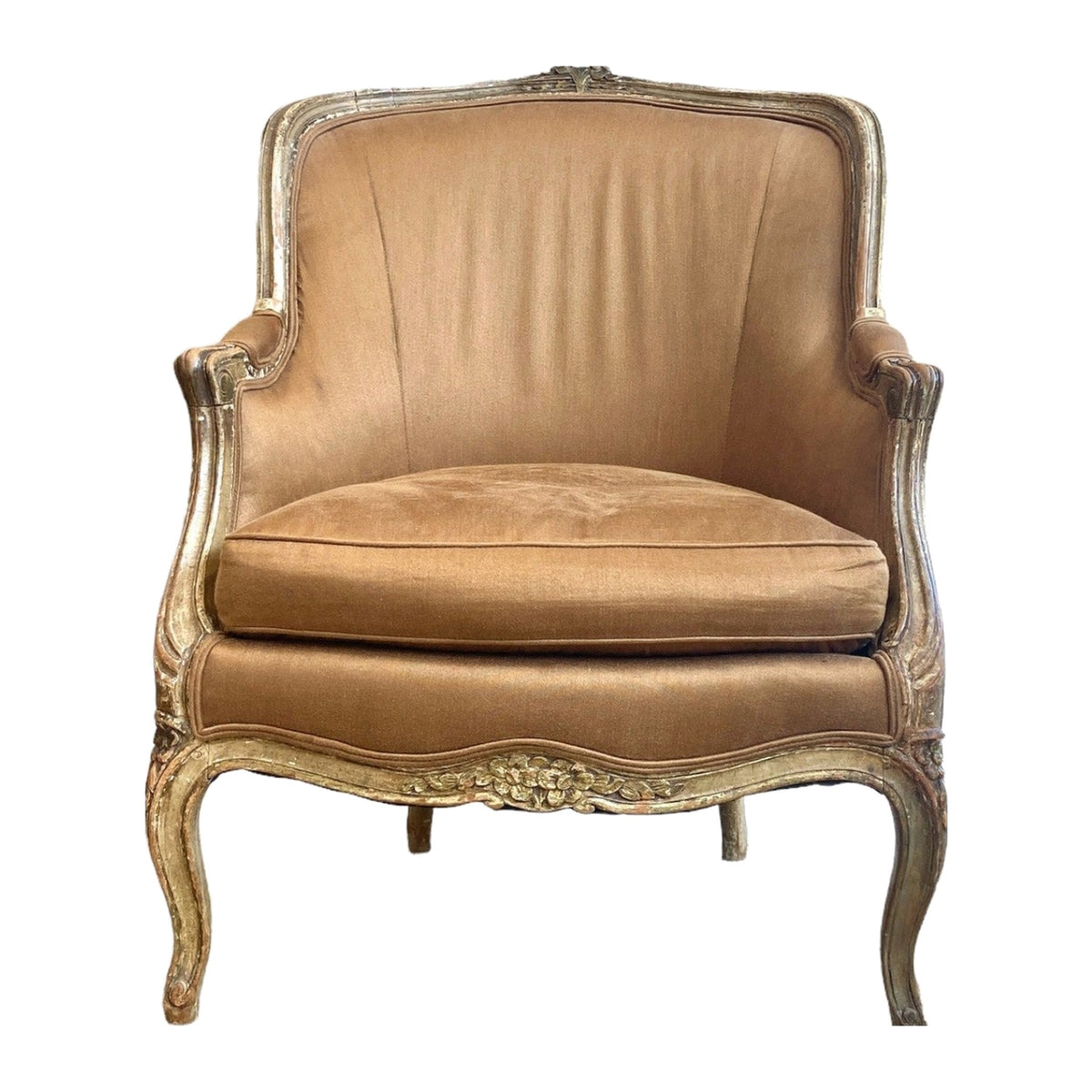 Antique 18th century French Louis XV Bergere Chair on a white background