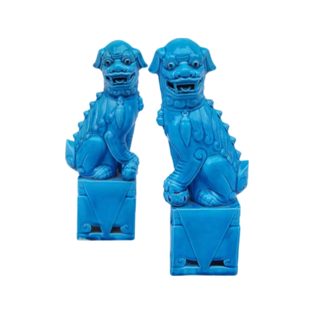 A Pair, Turquoise Porcelain Foo Dog Sculptures on a white background
