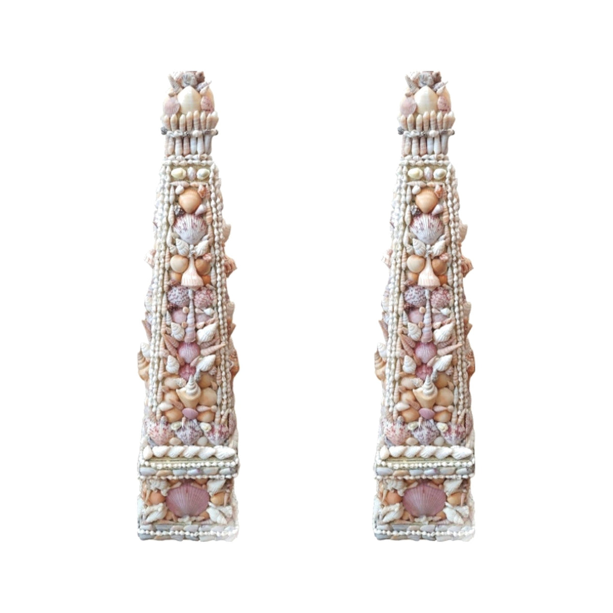 A Pair, Shell Obelisks on a white background